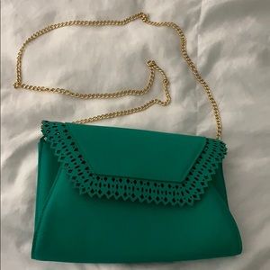 Scalloped green purse